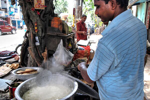 Man cooking rice