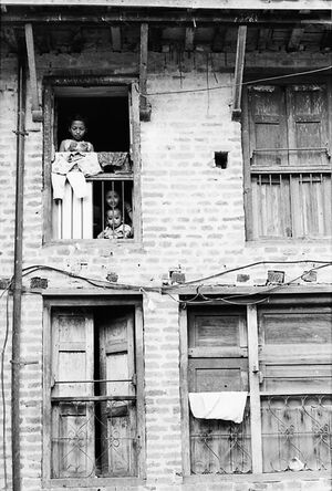Mother and kids by window