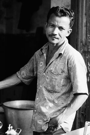 Man wearing scroll-printed shirt