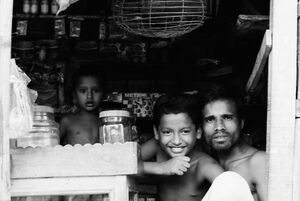 Parent and children in shop