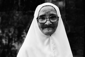 Older woman exposing face