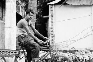 Young man on tricycle