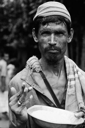 Man holding dish