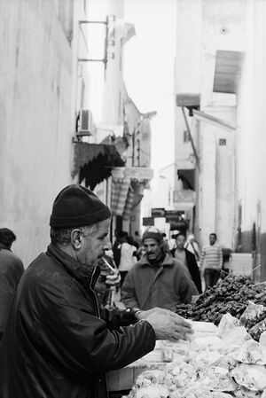 Man working in busy lane
