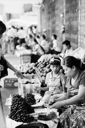 Woman selling grapes