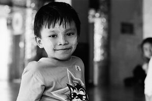 Boy playing in Shwedagon Paya