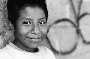 Boy cracking smile