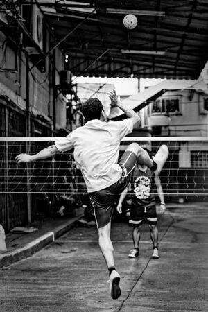 Man playing Sepak takraw