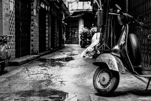 Motorbike parked in deserted lane