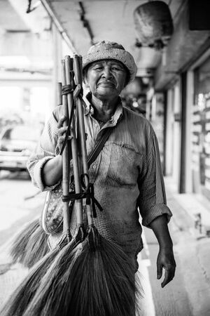 Female broom seller