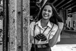 Long-haired school girl smiling