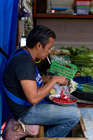 Man working while smoking