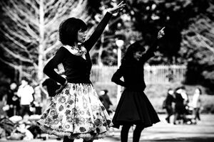 Dancing women striking pose together