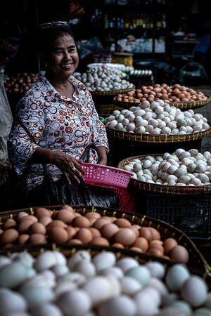 Woman selling eggs in market in Dalah