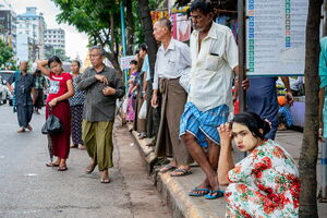 People waiting for bus at bus stop