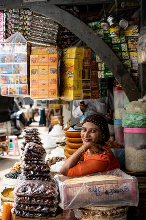 Woman surrounded by goods