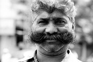 Man wearing handlebar mustache