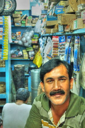 Calm man in small shop