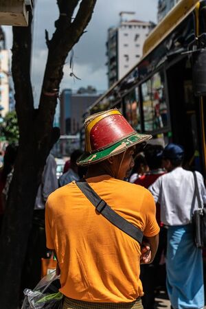 Man wearing vivid hat