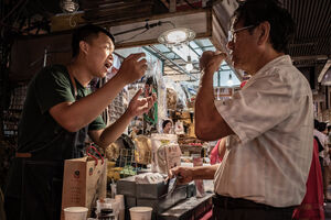 Man giving big sales talk about Taiwanese tea