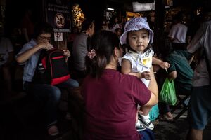 Little girl in Spanish restaurant in Chatuchak Market