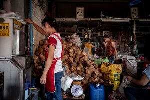 Heap of coconuts in Khlong Toei Market