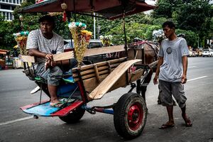 Coachmen waited for customers near Fatahillah Square in Jakarta