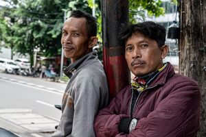 Cool-looking motorbike taxi drivers