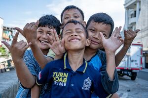 Boys striking a pose happily