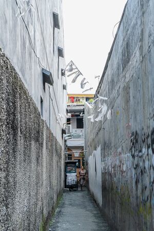 Narrow alleyway between walls