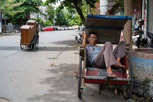Man with an agonized expression napping on a Beck