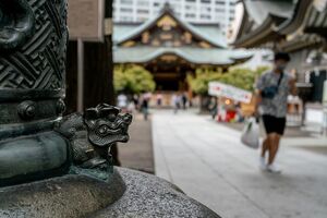 Guardian dog at Torii of Yushima Tenjin