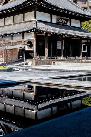 Main hall of Zuisho-ji Temple reflected in the water