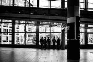 High school boys stopping at a connecting passage in Shibuya