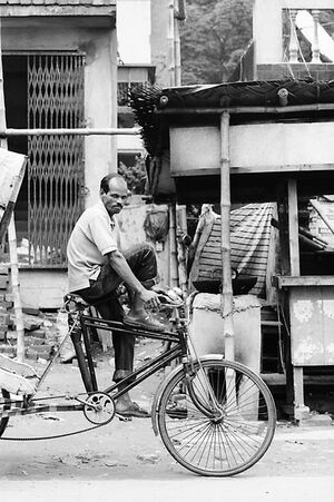 Man riding on cycle rickshaw