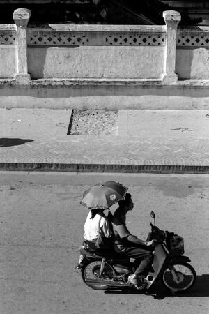 Umbrella on motorbike