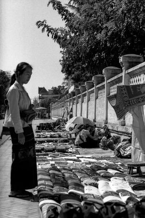 woman standing on sidewalk