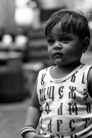 Boy wearing shirt with Cyrillic letters