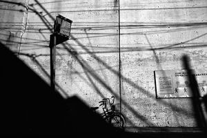  Bicycle propped against wall