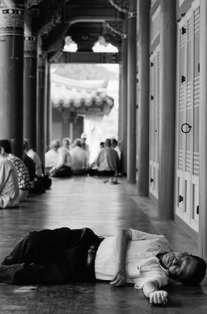 Local people relaxing in hall