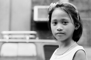 Girl wearing a floral hair band