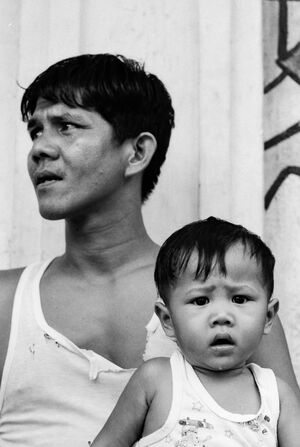 Father and son looking confused