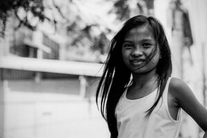 Long-haired girl smiling
