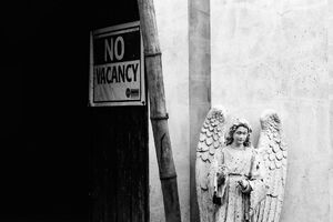 Angel standing at entrance