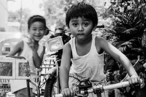 Boy playing on bike
