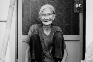 wrinkled smile of an older woman