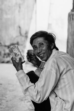 Man having lotteris in hand