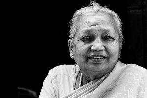 Dainty older woman in Patan
