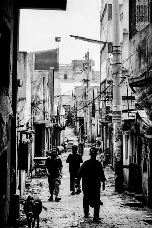 Silhouetted pedestrians