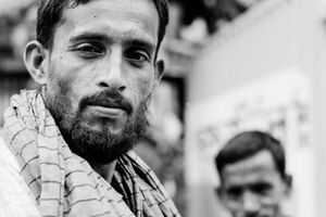Bewhiskered rickshaw man